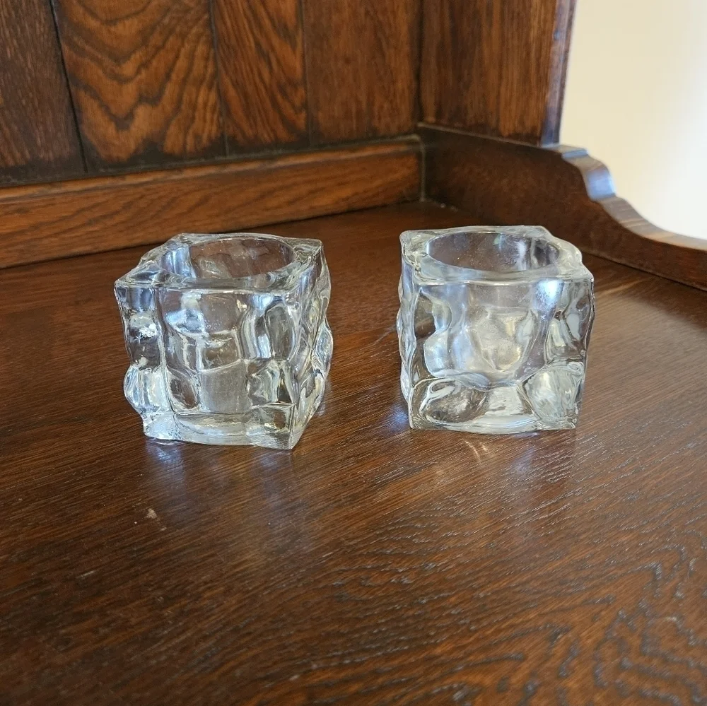 Glass ice cube candle votives.